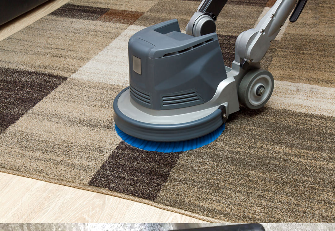 Hustle Harder cleaning a rug